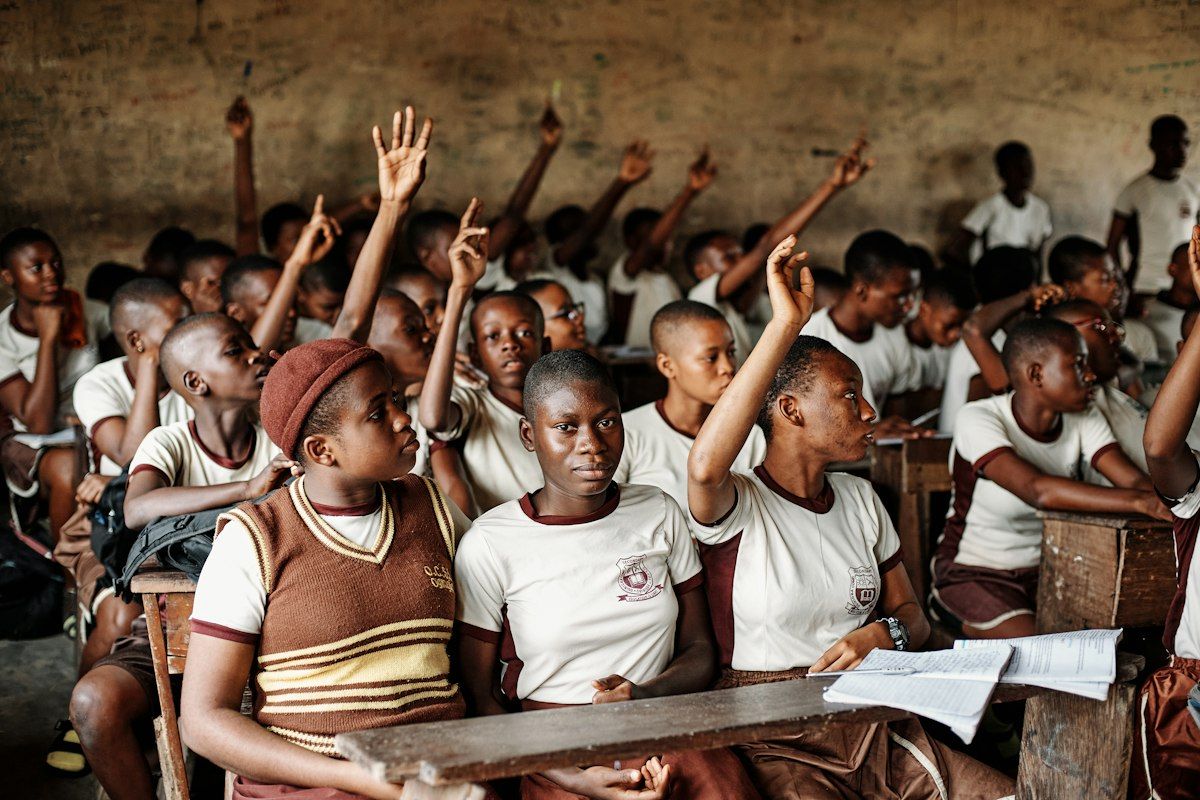 Children sitting in a classroom learning